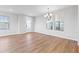 Bright living room featuring wood floors, and large windows at 251 Washington St, Erie, CO 80516