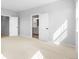 Spacious main bedroom with natural light and views of the bath and bedroom entrances at 251 Washington St, Erie, CO 80516