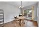 Cozy dining room with wooden table and chairs, and plenty of natural light at 9270 107Th E Pl, Commerce City, CO 80640