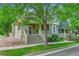 Charming home with well-kept lawn, a cozy front porch and rock garden at 9270 107Th E Pl, Commerce City, CO 80640