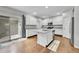 Bright kitchen with white cabinets, granite countertops, and stainless steel appliances at 9270 107Th E Pl, Commerce City, CO 80640
