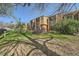 Spacious backyard with mature trees offering shade and privacy for outdoor activities and relaxation at 6492 Simms St # A, Arvada, CO 80004