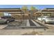 Assigned parking spaces with covered carports for each unit in this multi-Gathering dwelling at 6492 Simms St # A, Arvada, CO 80004