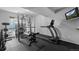 Home gym featuring a treadmill and weightlifting equipment at 2880 Breezy Ln, Castle Rock, CO 80109