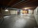 Unfinished basement with concrete floors and utility equipment at 16180 E Flora Pl, Aurora, CO 80013