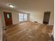 Spacious living room with ample natural light, ready for customization and flooring updates at 16180 E Flora Pl, Aurora, CO 80013