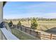 Scenic backyard view overlooking a well-maintained green space and neighboring houses at 10052 Isle St, Parker, CO 80134