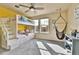Spacious bedroom with a fun bunk bed and a relaxing hammock chair at 10052 Isle St, Parker, CO 80134