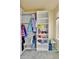 Well-organized closet with shelving and hanging space for optimal storage at 10052 Isle St, Parker, CO 80134