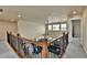 Open and airy loft space with a view of the living room and backyard at 10052 Isle St, Parker, CO 80134