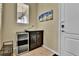 Mud room featuring tile floors, storage and an exterior door at 10052 Isle St, Parker, CO 80134