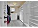 Huge walk-in closet with custom organizers, shelving, and drawers at 10052 Isle St, Parker, CO 80134