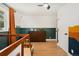 bedroom features wood floors, modern accents, and views at 1420 W Ridge Rd, Littleton, CO 80120