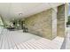 Inviting covered deck offers an ideal outdoor space for relaxing or entertaining at 1420 W Ridge Rd, Littleton, CO 80120