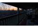 Covered patio provides sunset views and includes comfortable outdoor seating at 1420 W Ridge Rd, Littleton, CO 80120