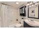 Clean bathroom with a shower/tub combo, vanity, and mirrored cabinet at 1608 Cottonwood Dr # 4, Louisville, CO 80027