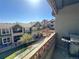Balcony featuring a grill and a view of the neighborhood at 11983 W Long Cir # 203, Littleton, CO 80127
