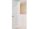 A modern white interior door provides access to living spaces at 1448 Orchard St, Brighton, CO 80601