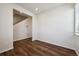 Versatile room with hardwood floors and a bright window, ready to adapt to your needs at 1448 Orchard St, Brighton, CO 80601