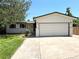 Charming one-story home featuring a two-car garage, well-kept lawn, and delightful curb appeal at 6484 S Datura St, Littleton, CO 80120