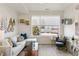 Open living space with light hard wood flooring, large window and simple decor at 5367 W 14Th Ave, Lakewood, CO 80214
