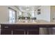 Close up of the kitchen sink, cabinets and stainless steel dishwasher at 13644 Ulster St, Thornton, CO 80602