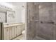 Bathroom featuring tiled shower and vanity at 8060 E Girard Ave # 712, Denver, CO 80231