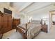 Comfortable bedroom with wood furniture at 8060 E Girard Ave # 712, Denver, CO 80231