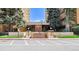 Welcoming building entrance with brick steps and manicured landscaping provides curb appeal at 8060 E Girard Ave # 712, Denver, CO 80231