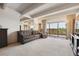 Bright living room with floor-to-ceiling windows and beautiful views at 8060 E Girard Ave # 712, Denver, CO 80231