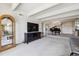 Spacious living room featuring a piano and open floorplan at 8060 E Girard Ave # 712, Denver, CO 80231