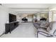 Spacious living room featuring a piano and open floorplan at 8060 E Girard Ave # 712, Denver, CO 80231