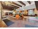 Spacious lobby featuring a fireplace, brick floors, and ample seating at 8060 E Girard Ave # 712, Denver, CO 80231