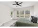 Bedroom with a queen bed and lots of natural light at 13456 Via Varra # 118, Broomfield, CO 80020