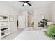 Bedroom with a queen bed, and access to bathroom and closet at 13456 Via Varra # 118, Broomfield, CO 80020