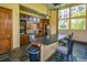 Well-equipped community kitchen with dark countertops at 13456 Via Varra # 118, Broomfield, CO 80020