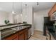 Modern kitchen with stainless steel appliances and granite countertops at 13456 Via Varra # 118, Broomfield, CO 80020