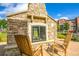 Community outdoor fireplace with seating area at 13456 Via Varra # 118, Broomfield, CO 80020