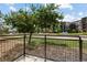 Private patio with metal railing overlooking courtyard at 13456 Via Varra # 118, Broomfield, CO 80020