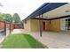 View of covered patio area and fenced yard at 353 S Niagara St, Denver, CO 80224