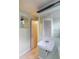 Traditional bathroom with a pedestal sink and wall mirror at 353 S Niagara St, Denver, CO 80224