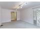 View of living room with carpet and access to back yard at 353 S Niagara St, Denver, CO 80224