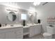 Double vanity bathroom with updated fixtures at 1765 Ingalls St, Lakewood, CO 80214