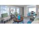 Bright living room with ample natural light and a view to the home office at 1765 Ingalls St, Lakewood, CO 80214