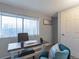 Home office with desk and comfortable chair at 1765 Ingalls St, Lakewood, CO 80214