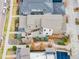 Aerial view of the house showing the roof, yard, and patio at 1848 W 68Th Ave, Denver, CO 80221