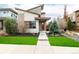 Modern home with landscaped front yard and unique architectural details at 1848 W 68Th Ave, Denver, CO 80221
