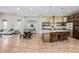 Stylish living room with an open floor plan that connects to the kitchen and dining areas at 1848 W 68Th Ave, Denver, CO 80221
