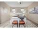The spacious main bedroom boasts neutral paint, plush carpet, modern lighting, and is pre-wired for a ceiling fan at 1848 W 68Th Ave, Denver, CO 80221