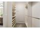 Custom designed walk-in closet offers plenty of storage and organization for all your wardrobe needs at 1848 W 68Th Ave, Denver, CO 80221